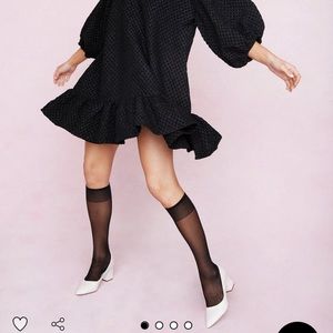 Black peplum, bubble sleeve dress